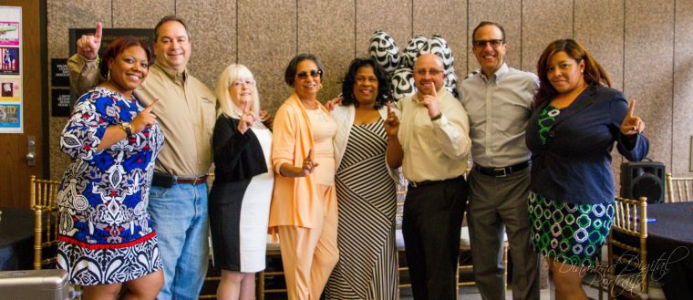 Dr. Cathy Hughes with Radio One Baltimore family