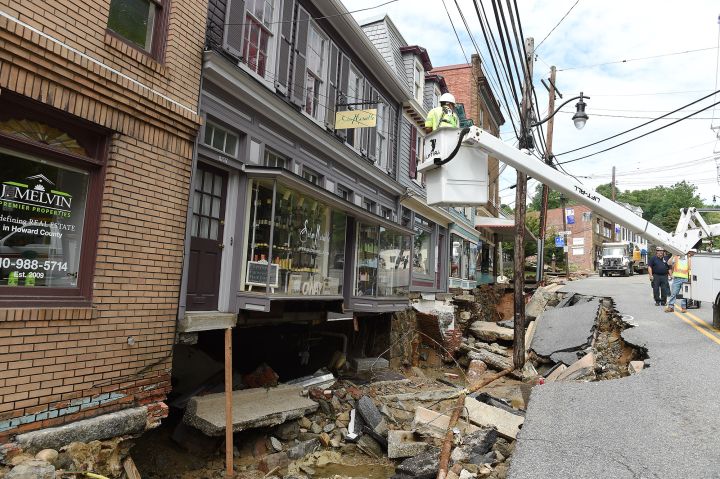 ELLICOTT CITY, MD - JULY 31: Rescue workers attend the destruct