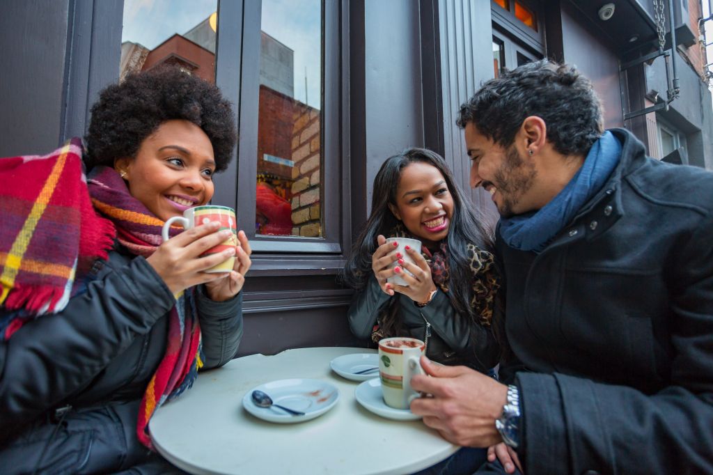 Young Friends Having Fun at a Cafe