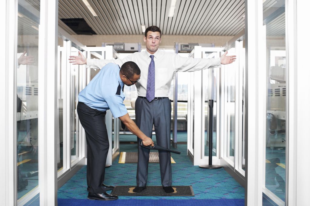 Airport Security Check with Young Businessman