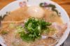 Japanese ramen soup with chicken, egg, chives and sprout