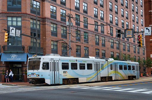 MTA Light Rail public transportation train in the streets of Baltimore