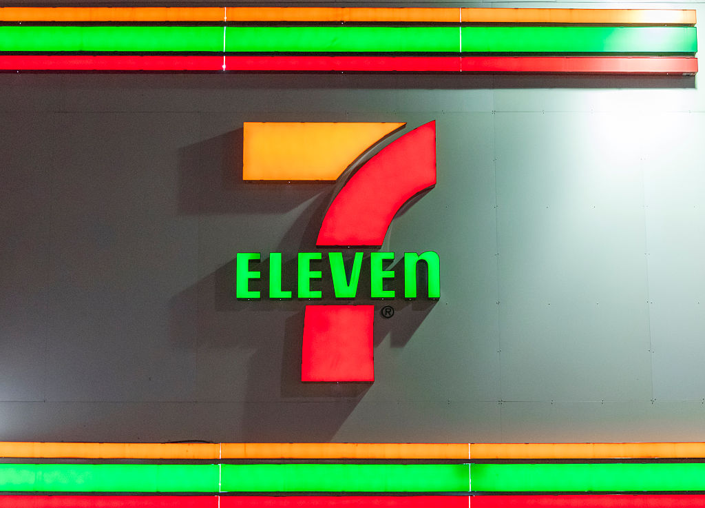 7-Eleven convenience store signage in downtown Toronto. 7-...