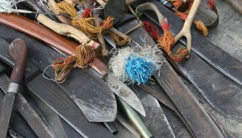 Machetes, slingshots and other weapons confiscated from militia by Australian so