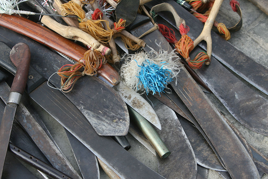 Machetes, slingshots and other weapons confiscated from militia by Australian so