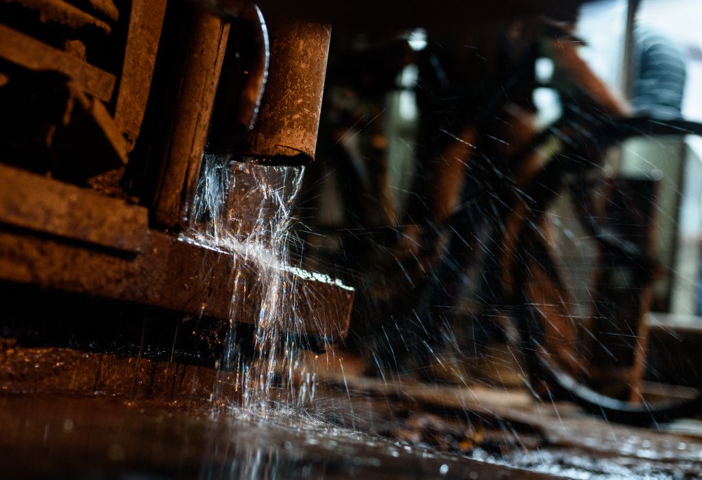 Close-Up Of Pipe Splashing Water