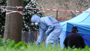 Woman's body found in shallow grave in Kew
