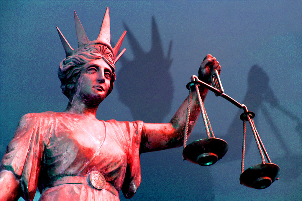 The Scales of Justice outside the District Court in Brisbane, 25 July 2003. AFR