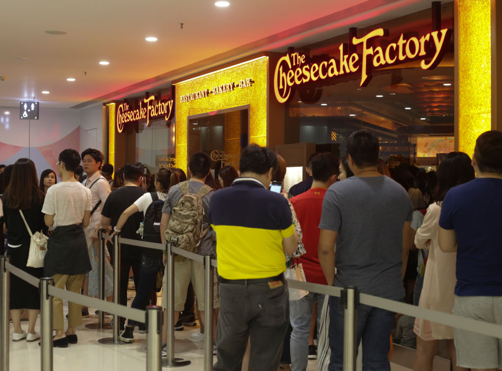 People queue up for the The Cheesecake Factory in Harbour City, Tsim Sha Tsui. 01MAY17. Photo: May Tse. [02MAY17 FEATURES FOOD ONLINE]