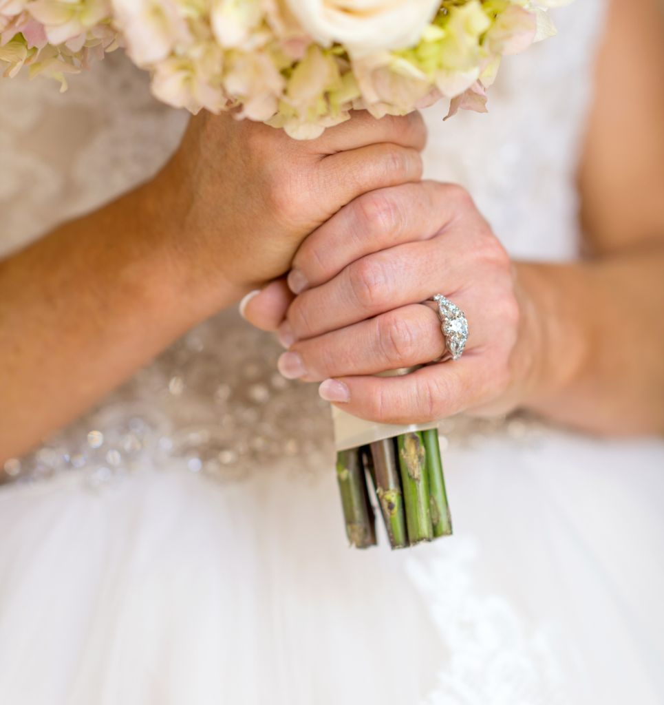 Bride holding bouquet of flowers