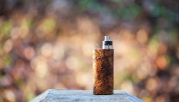 Close-Up Of Electronic Cigarette On Rock