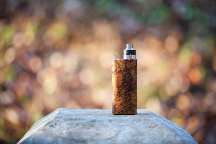 Close-Up Of Electronic Cigarette On Rock