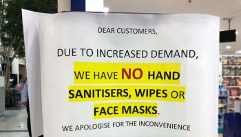 Sold out sign for hand sanitizer and face masks outside shop during coronavirus, COVID-19 pandemic