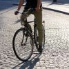 Man Cycling in Bruges, Belgium