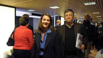 Bill and Melinda Gates walk in the Congr