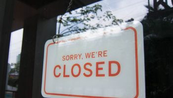 Closed sign on a store window