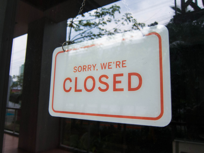 Closed sign on a store window