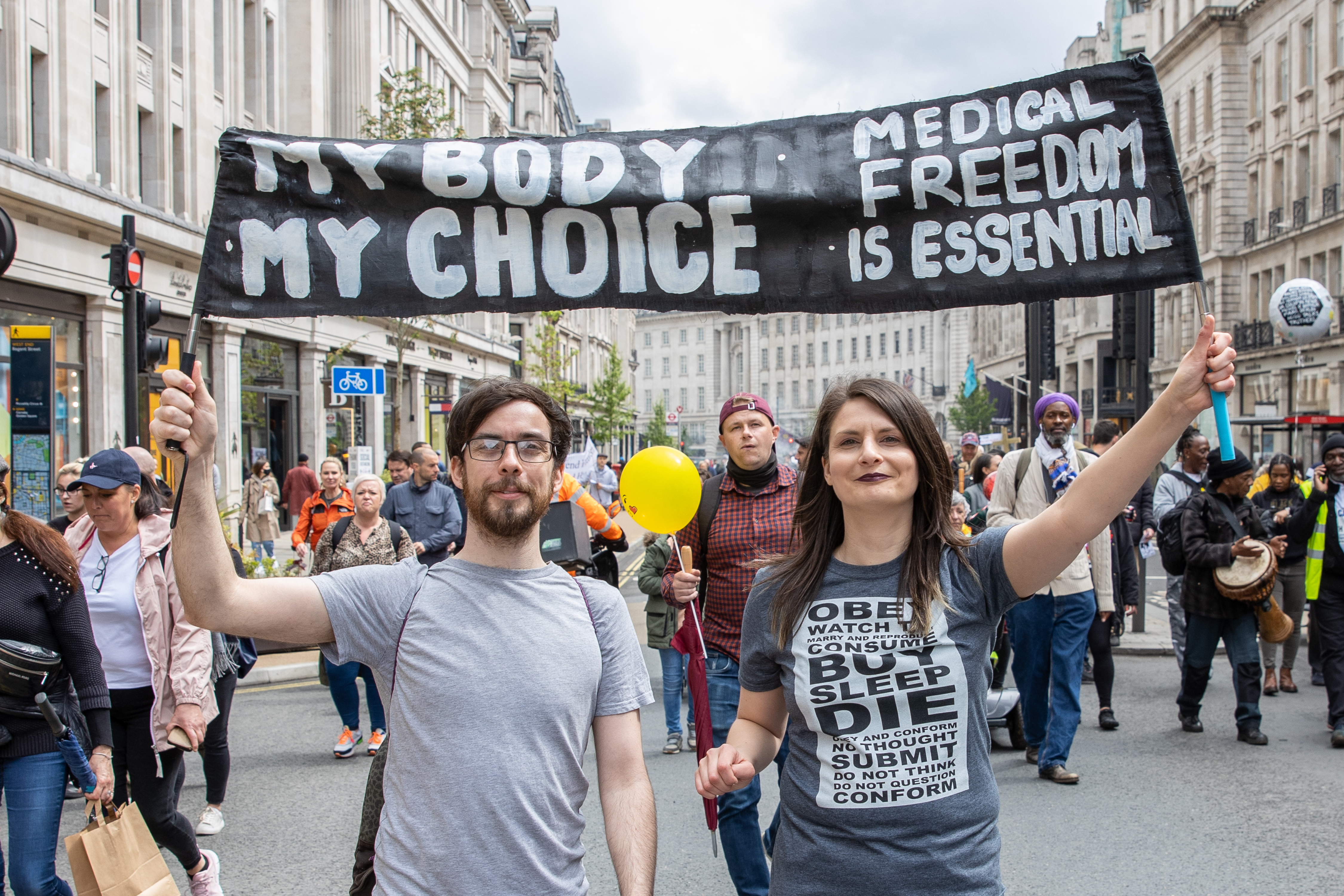 Anti lockdown and anti vaccine protestors march through London