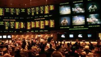 Sports Gamblers Betting at Casino Lounge