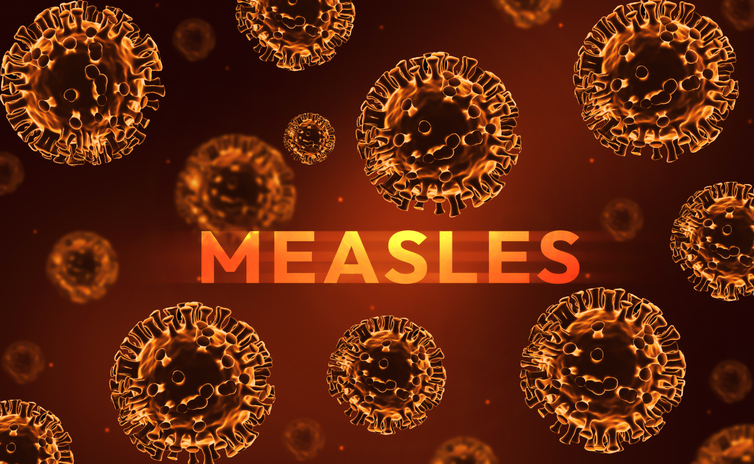 Measles disease outbreak concept design with orange and yellow virus along glowing typography. Measles virus, health, emergency background