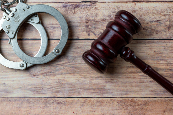 Judge's gavel and handcuffs