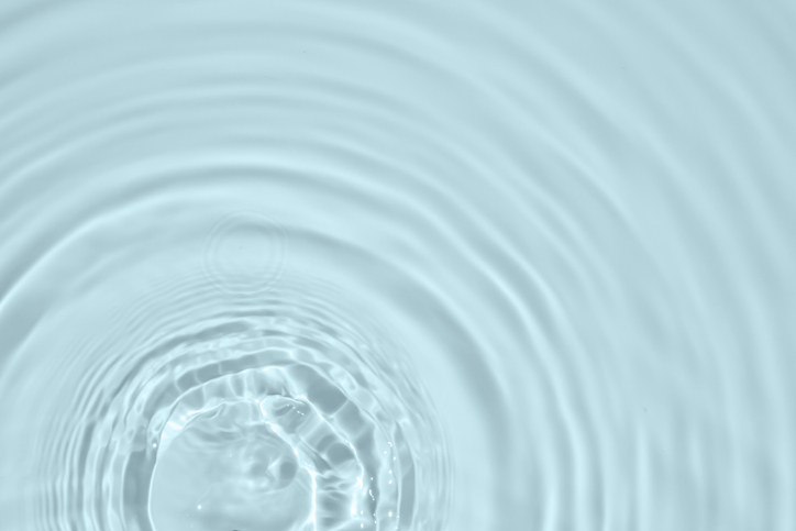 Abstract transparent water shadow surface texture natural ripple on blue background