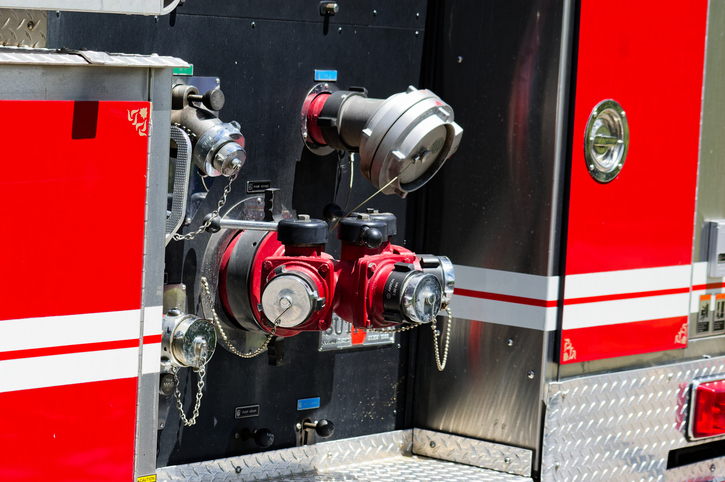 Fire Truck Close-Up Showing Intake Valves and Hoses